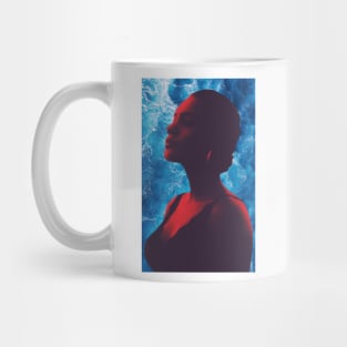 a red silhouette of a proud woman in the ocean Mug